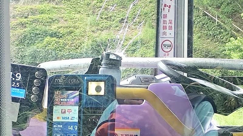 Hong Kong bus driver escapes death as metal pole pierces windscreen, hits chest