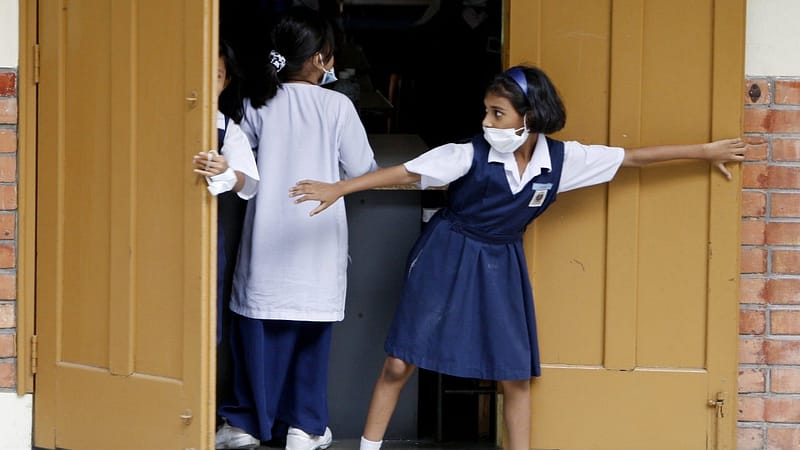 Flu outbreak forces Malaysian schools to close ahead of crucial exams
